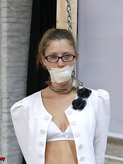 16 of Business lady tape gagged and handcuffed