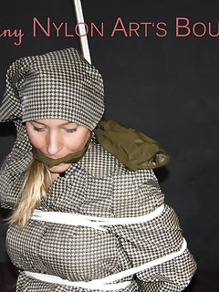 16 of Sexy Sandra being tied and gagged overhead with