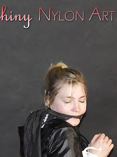 16 of NEW MODELL MIA being tied and gagged with ropes