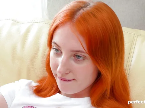 Redhead Emma Korti plays